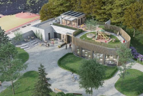 U jezírka vyrostl dům pro 24 dětí se zelenou střechou